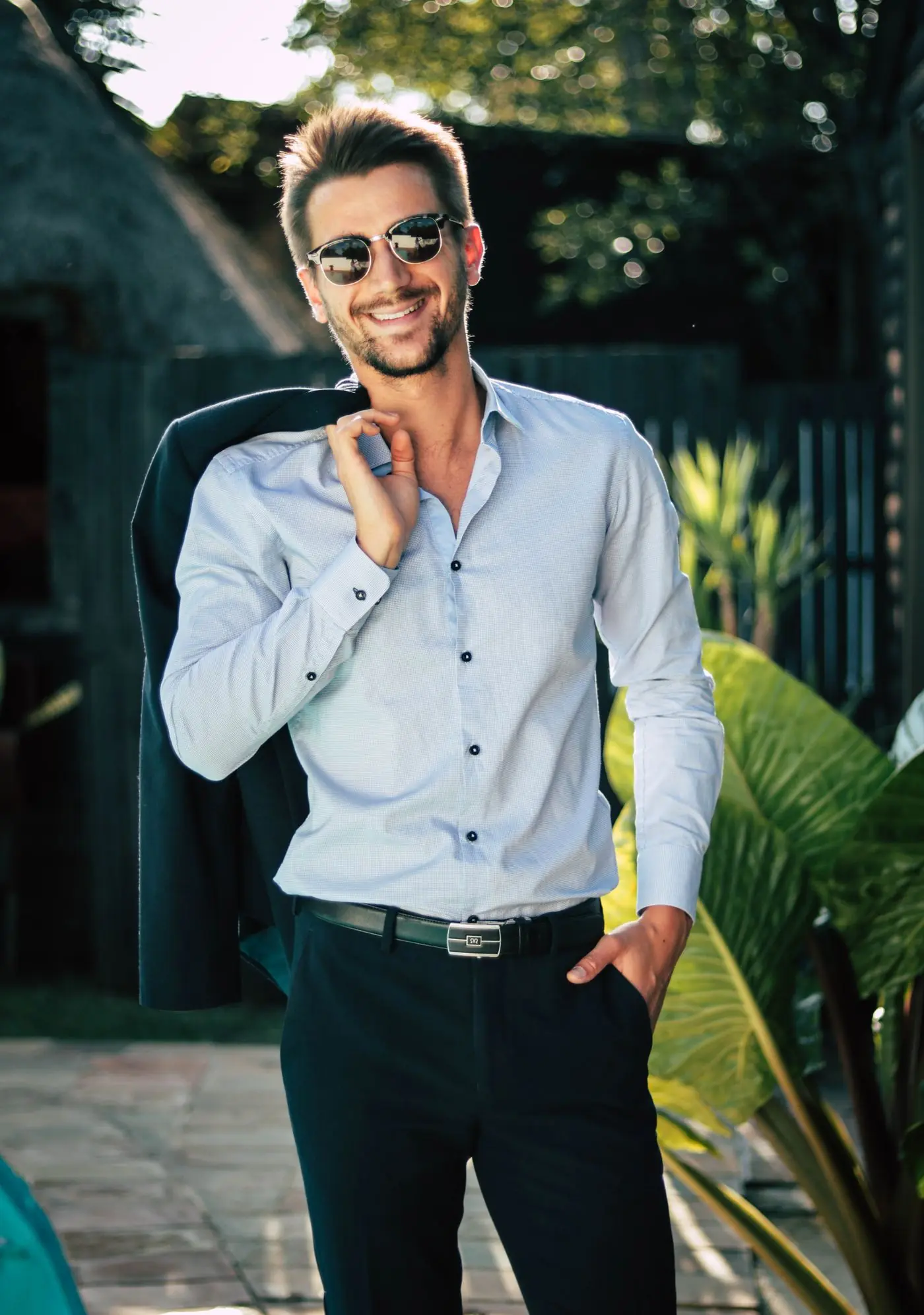 Man adjusting a jacket cuff